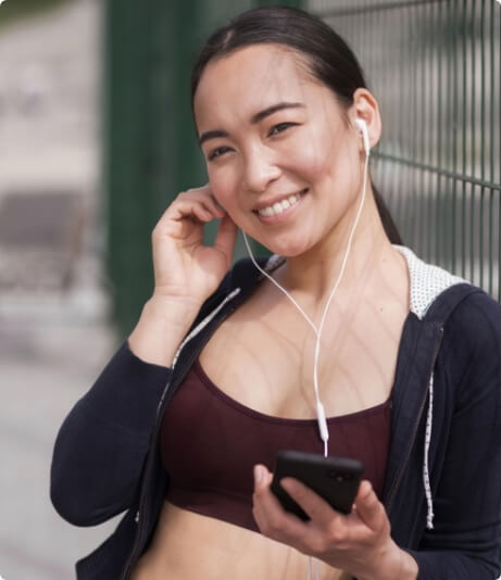 woman in sport outfit smiling